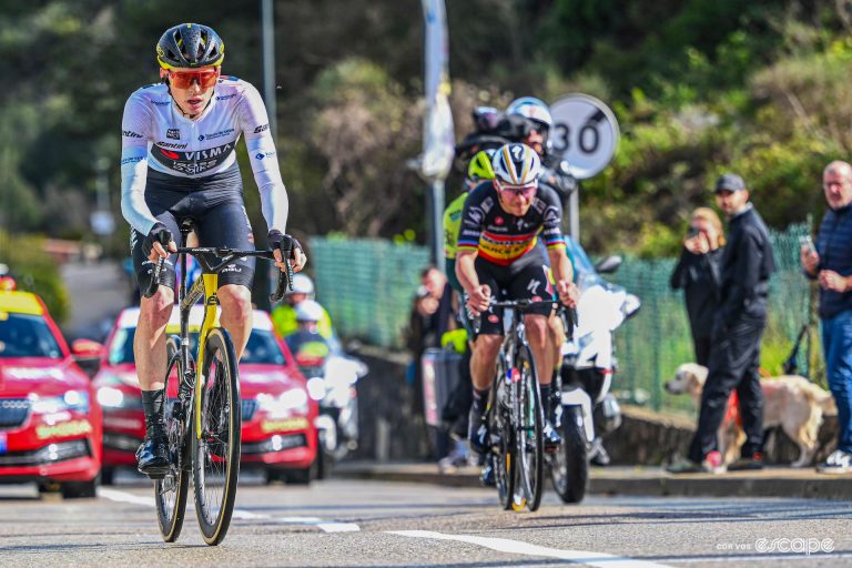 Matteo Jorgenson in the white jersey of best young rider accelerates away from Remco Evenepoel during stage 8 of Paris-Nice 2024.